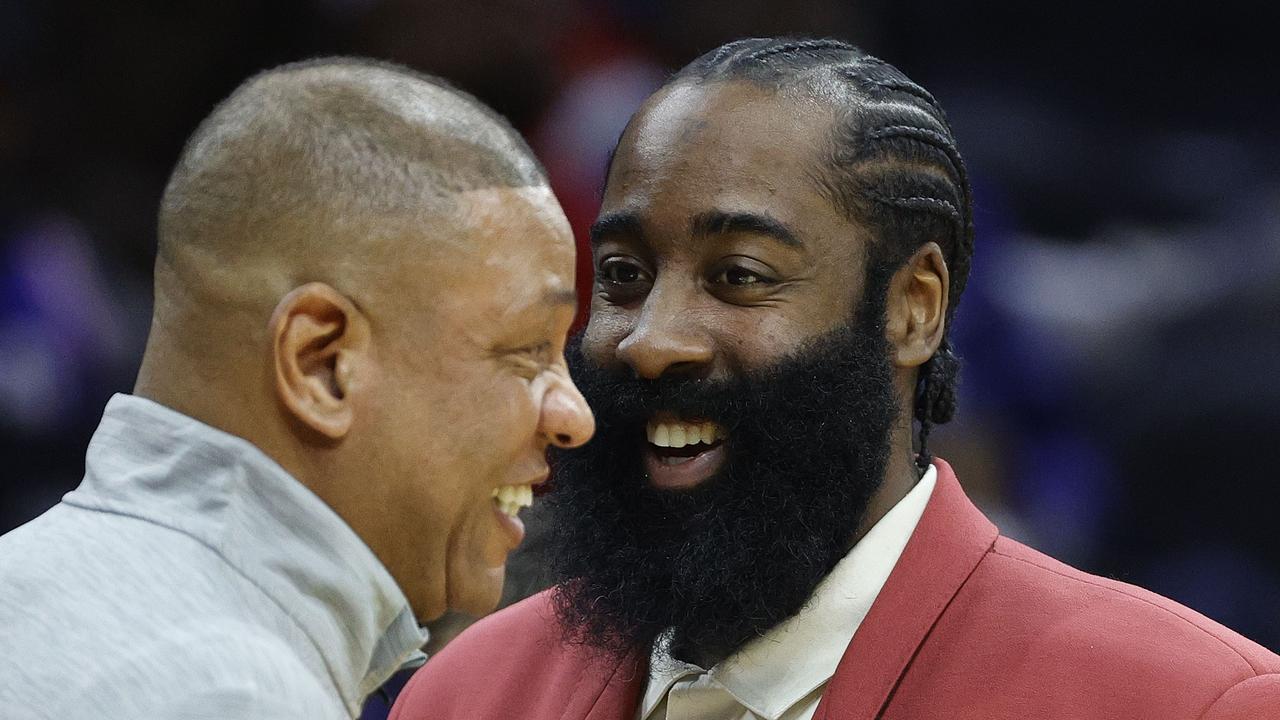 PHILADELPHIA, PENNSYLVANIA - FEBRUARY 15: James Harden #1 (R) and head coach Doc Rivers of the Philadelphia 76ers interact during the fourth quarter against the Boston Celtics at Wells Fargo Center on February 15, 2022 in Philadelphia, Pennsylvania. NOTE TO USER: User expressly acknowledges and agrees that, by downloading and or using this photograph, User is consenting to the terms and conditions of the Getty Images License Agreement. Tim Nwachukwu/Getty Images/AFP == FOR NEWSPAPERS, INTERNET, TELCOS &amp; TELEVISION USE ONLY ==