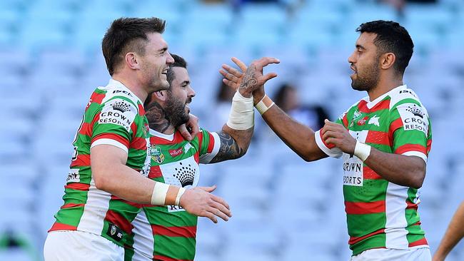 Adam Reynolds of the Rabbitohs (second left) celebrates with Angus Crichton and Alex Johnston after scoring a try during the Round 18 NRL match between the Canterbury-Bankstown Bulldogs and the South Sydney Rabbitohs at ANZ Stadium in Sydney, Saturday, July 14, 2018. (AAP Image/Dan Himbrechts) NO ARCHIVING, EDITORIAL USE ONLY