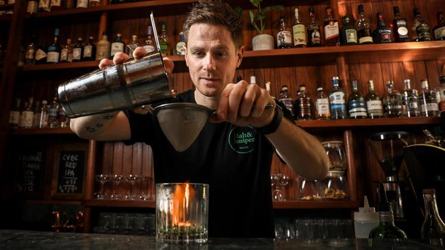 SourceSA feature on new bars in Adelaide - Malt & Juniper has just been nominated for a design award -  Managing Partner Matt Holding makes a "Herb Harvest' flaming drink, Tuesday September 4, 2018 - pic AAP/MIKE BURTON