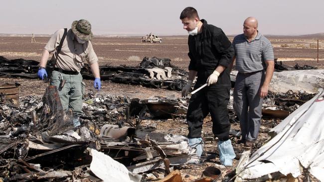 Russian investigators inspect the debris from the crashed Russian jet in 2015. Picture: AAP