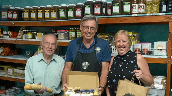 FROMMAGE FRIENDS: John Rasch of Adelaide, John Evans of Rockhampton Fine Foods and Susan Hagan say 'cheese' at Rockhampton Fine Foods. Picture: Jann Houley
