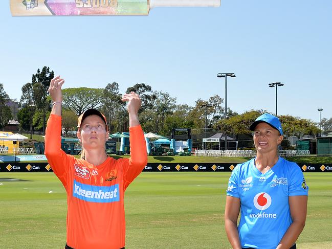 Strikers v Scorchers: Suzie Bates calls as Meg Lanning tosses the bat. Bates wins sends Perth into bat. Picture: BRADLEY KANARIS/GETTY IMAGES