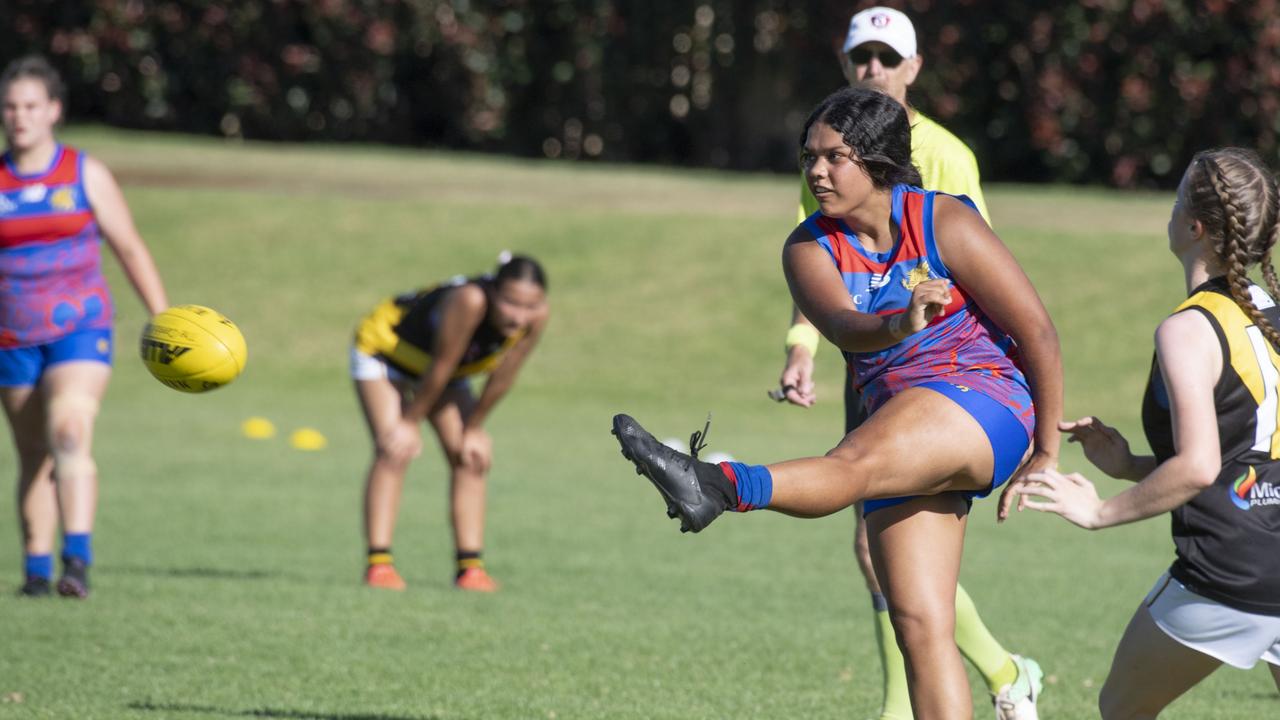 Charlee Lamb kicks for Downlands. Picture: Nev Madsen.