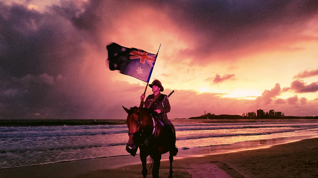 Lone horseman Rusty and Jack at a past Mooloolaba Anzac Day Dawn Service. Picture: Vicki Keegan