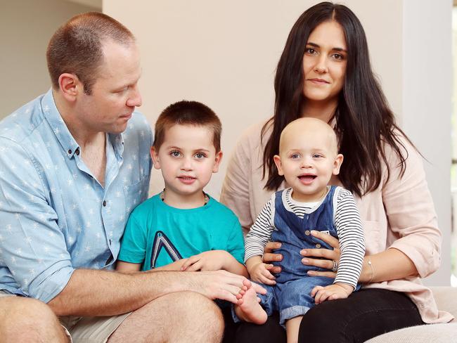 Lace and Sean Cogan with their kids Knox and Tex, who has been diagnosed with a rare type of eye cancer. Picture: Tim Hunter.