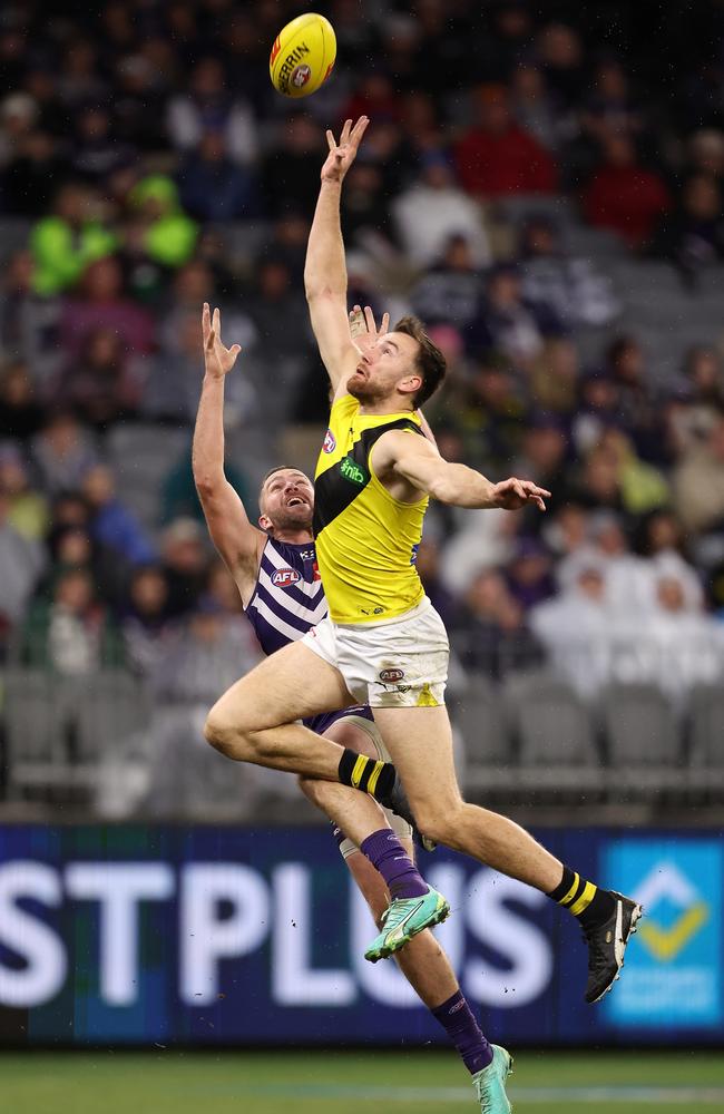 Noah Balta and Luke Ryan compete in the air. Picture: Paul Kane/Getty Images