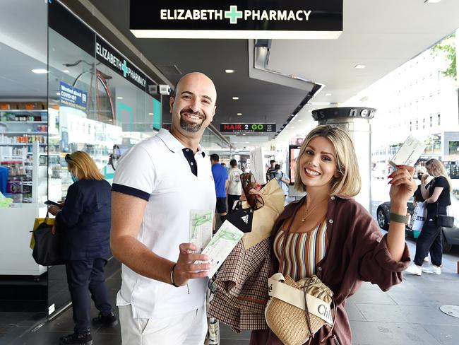 Milad Talebian and Leila Beffar queued at Elizabeth Pharmacy to buy RATs. Picture: Nicki Connolly