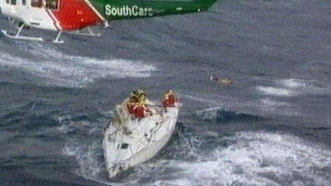 The crew aboard Sword Of Orion await rescue from Marc Pavillard and the Southcare rescue helicopter. Picture: Justin Lloyd 