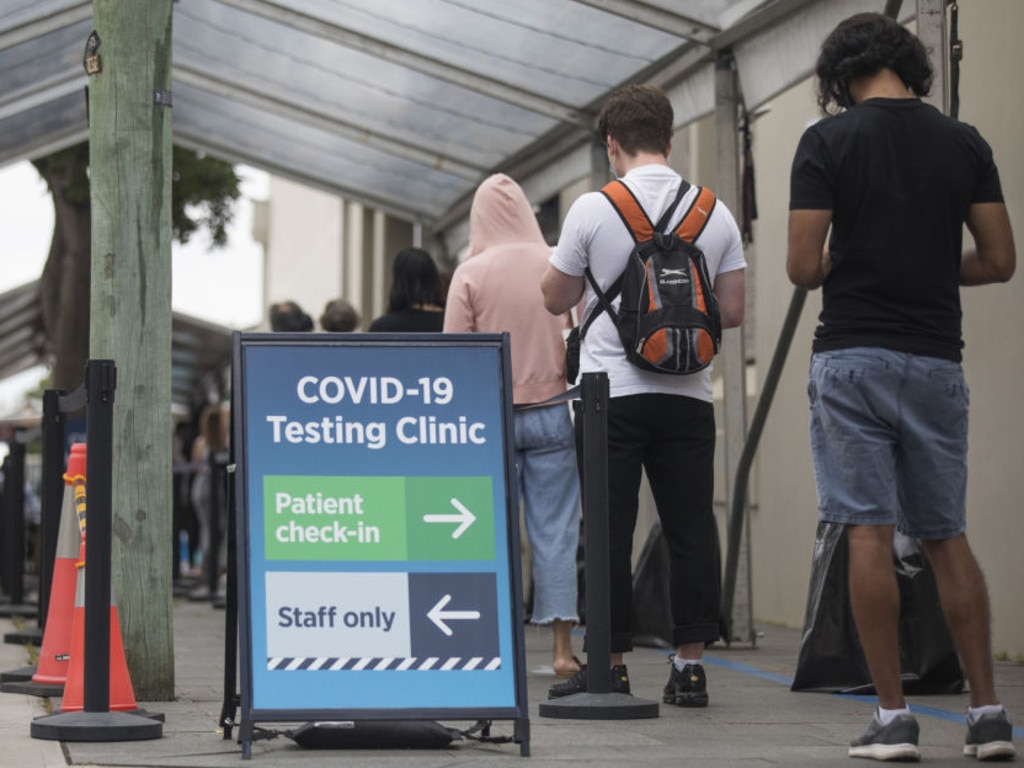 Members of the public wait in line outside a Covid-19 testing clinic in Sydney, Australia.
