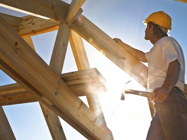 builder looking up at the sky. worker - Stock image