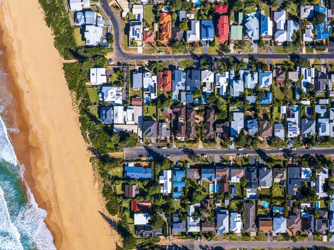 Suburban roof tops with beach; Australian housing overhead generic