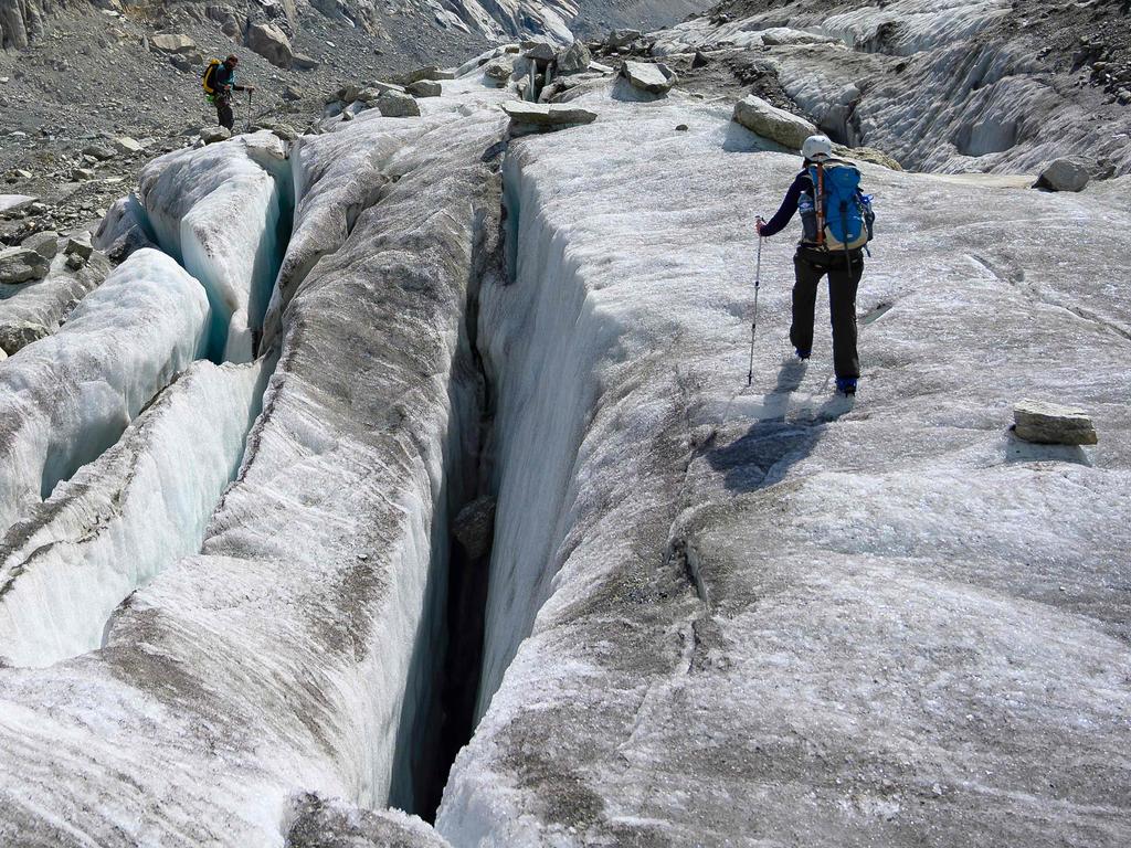 For guides, the unpredictability of the conditions is making a dangerous job even more nerve-wracking. Photo: Marco Bertorello/AFP)