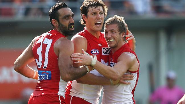 Adam Goodes, Kurt Tippett and Kieren Jack celebrate a goal. Picture: Phil Hillyard