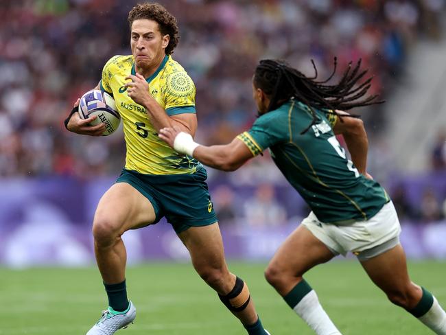 Mark Nawaqanitawase representing Australia at the Paris Olympics. Picture: Cameron Spencer/Getty Images