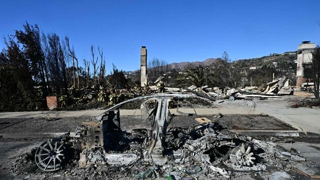 A car destroyed by the Palisades Fire is seen in the Pacific Palisades neighbourhood of Los Angeles. Picture: AFP