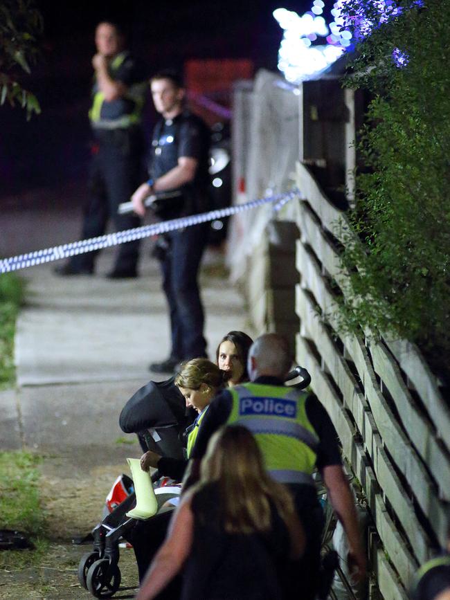 Police take witness statements on Balinga Court. Picture: Patrick Herve