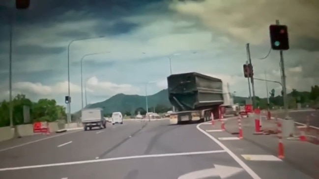 Truck drives through red light on Captain Cook Highway