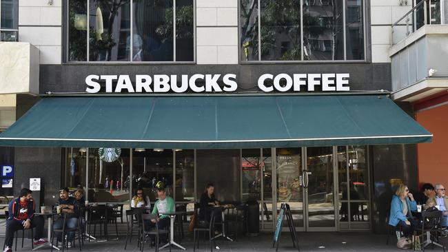 This Starbucks, in Melbourne’s City Square, is one of the few still open in Australia. Picture: Andy Brownbill