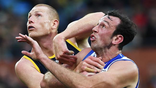 Todd Goldstein of the Kangaroos rucks against Sam Jacobs of the Crows in August. Picture: Mark Brake/Getty Images