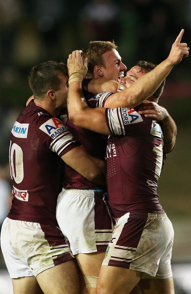 The Sea Eagles celebrate the winning field goal by Daly Cherry-Evans against the Knights.