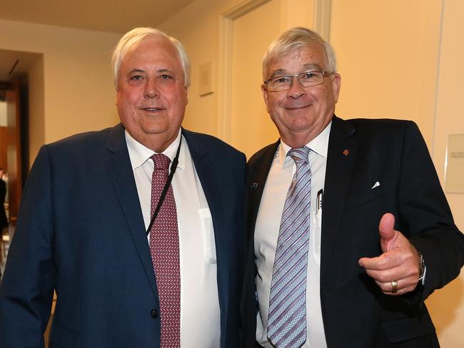 Clive Palmer and Senator Brian Burston at Parliament House in Canberra. Picture Kym Smith