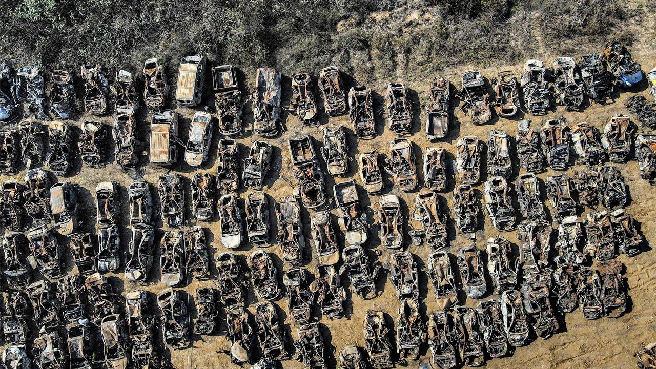 The burnt out husks of vehicles destroyed during Hamas’s attack earlier this month. Picture: Jack Guez/AFP