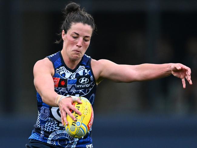 MELBOURNE, AUSTRALIA - OCTOBER 15: Kerryn Peterson of the Blues kicks during the round seven AFLW match between Carlton Blues and Collingwood Magpies at Ikon Park, on October 15, 2023, in Melbourne, Australia. (Photo by Quinn Rooney/Getty Images)