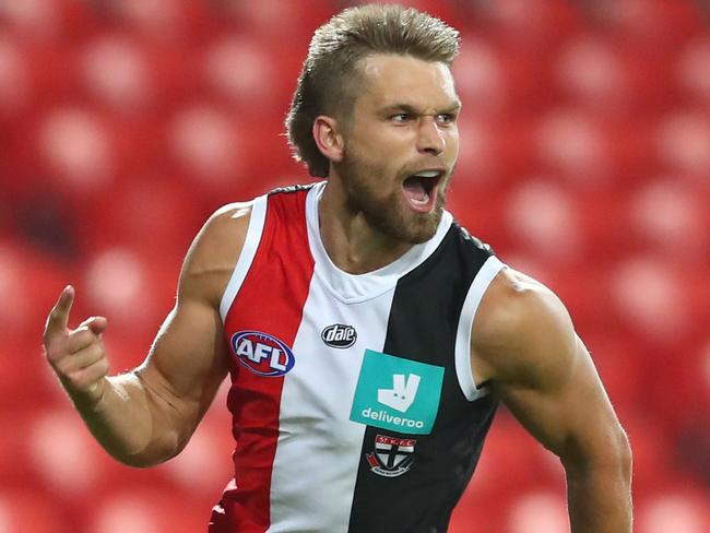 GOLD COAST, AUSTRALIA - AUGUST 06: Dan Butler of the Saints celebrates a goal during the round 10 AFL match between the Gold Coast Suns and the St Kilda Saints at Metricon Stadium on August 06, 2020 in Gold Coast, Australia. (Photo by Chris Hyde/Getty Images)