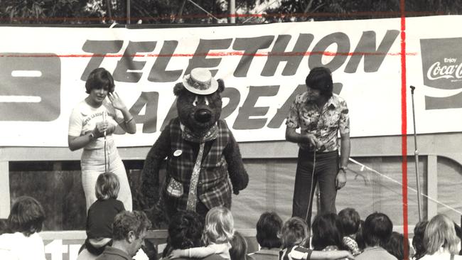 Dean Davis, Humphrey Bear and Helen Woods at a Telethon SA appeal event in 1975.