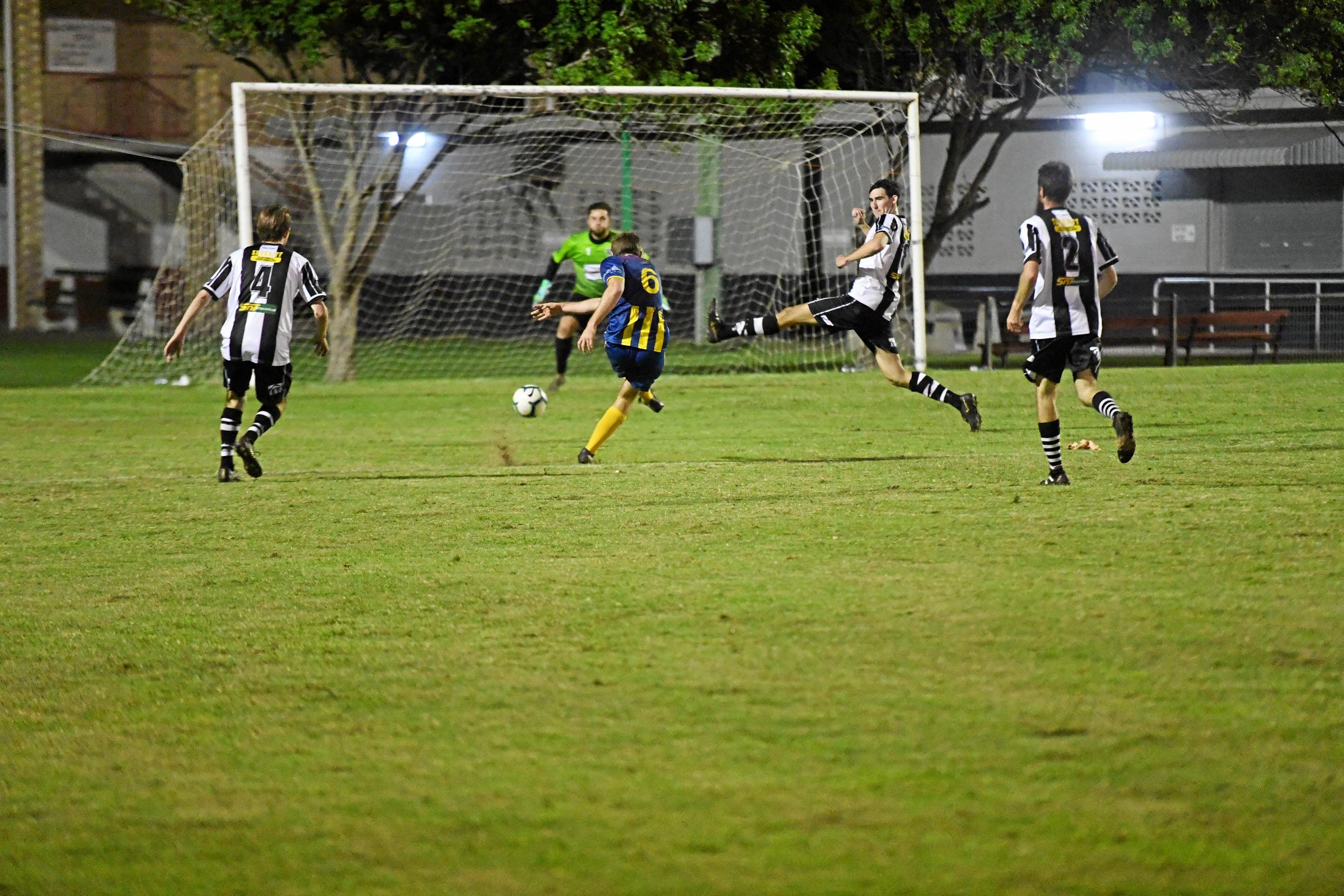 The Waves' Matt Twyford shoots and scores during extra time in the Triple M Division 1 Cup final. Picture: Shane Jones