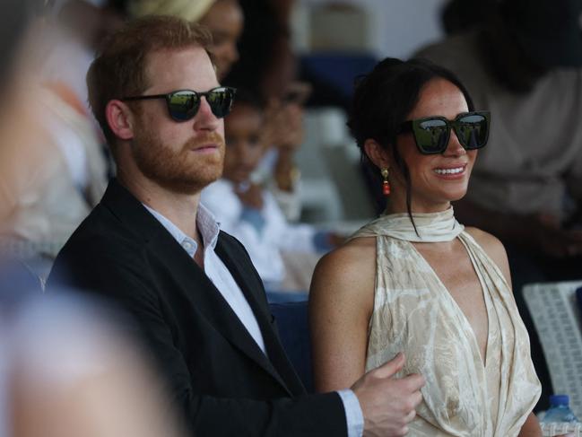 Prince Harry (L), Duke of Sussex, and Britain's Meghan (R), Duchess of Sussex, attend a charity polo game at the Ikoyi Polo Club in Lagos on May 12, 2024 as they visit Nigeria. Picture: AFP