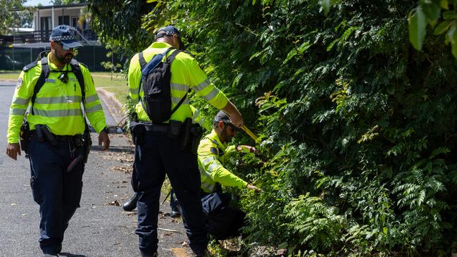 Police search for a murder weapon on Sandalwood Street in Nightcliff the day after the stabbing death of Nightcliff Friendly Grocer owner Linford Feick. Picture: Pema Tamang Pakhrin