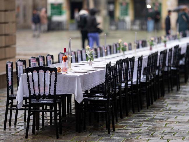 A Shabbat table with empty places for the 220 hostages is displayed in Vienna as part of the Israeli initiative 'Hostages and Missing Families Forum - Bring them home now'. Picture: AFP