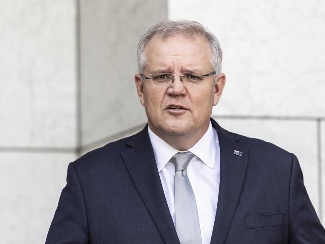 Prime Minister Scott Morrison with Neville Power the new chairman of COVID-19 commission during a press conference at Parliament House in Canberra. Picture Gary Ramage