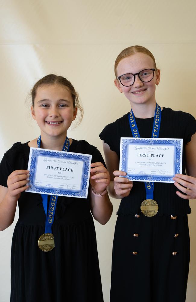 Piper Cracknell and Alice Francis won first place in the string duet (10 years and under) at the Gympie Eisteddfod. August 1, 2023. Picture: Christine Schindler