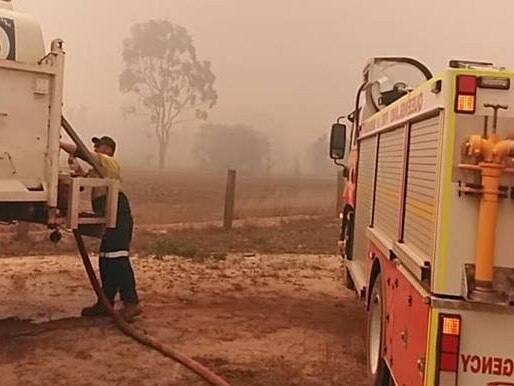 Emergency services work to contain the blaze at Matchbox Rd, Deepwater. Picture: Leslie Cullen