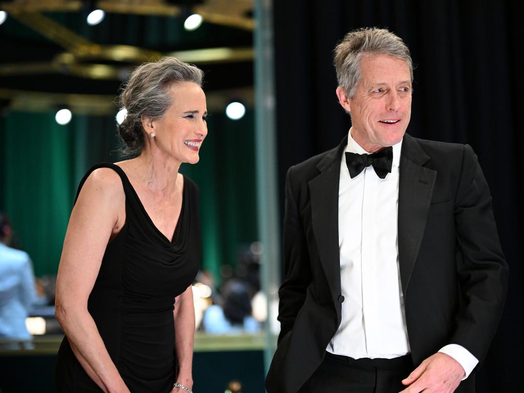 Andie MacDowell and Hugh Grant backstage during the 95th Annual Academy Awards. Picture: Getty Images.