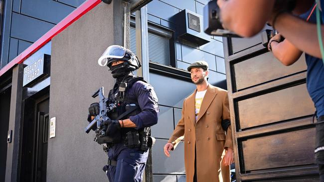 Tristan Tate is brought in for questioning by the Romanian gendarmes in August 2024. Picture: Daniel Mihailescu/AFP