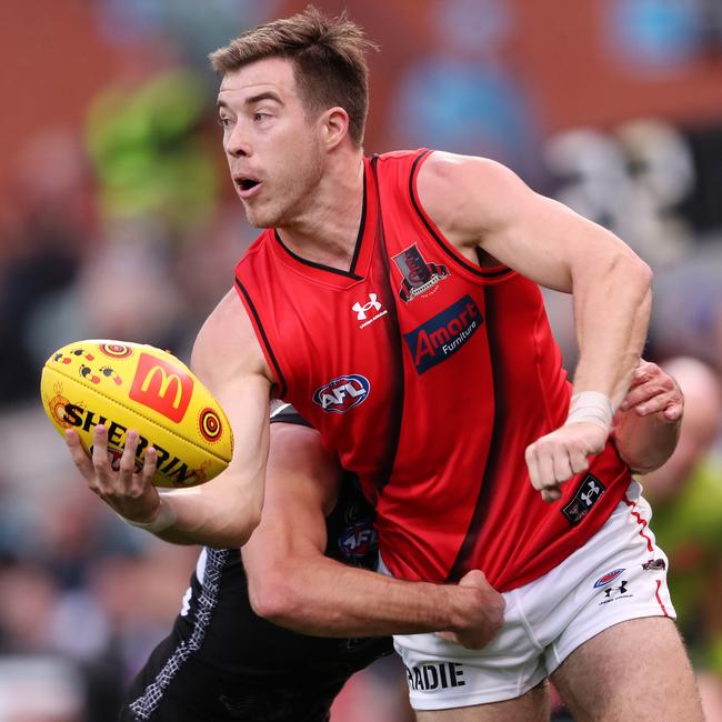 Ross Lyon rates Zach Merrett as the next skipper of the Bombers. Picture: Sarah Reed/AFL Photos via Getty Images