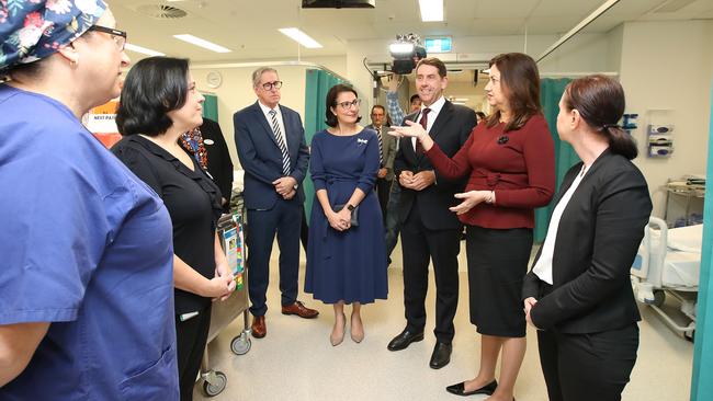 Premier Annastacia Palaszczuk (second Left) speaks to staff at the Mater Private hospital in Springfield. Picture: NCA NewsWire / Jono Searle