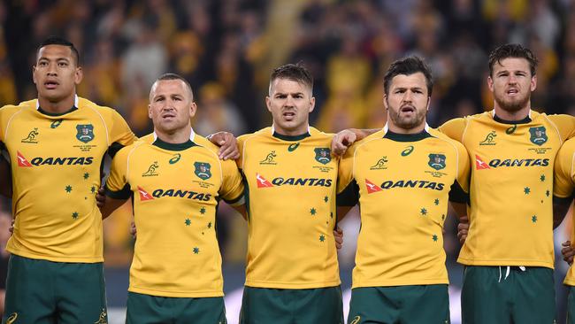 L to R; Wallabies players Israel Folau, Matt Giteau, Drew Mitchell, Adam Ashleigh-Cooper and Rob Horne sing the national anthem prior to the Rugby Championship test match between the Australian Wallabies and South African Springboks at Suncorp Stadium in Brisbane Saturday, July 18, 2015. (AAP Image/Dave Hunt) NO ARCHIVING, EDITORIAL USE ONLY