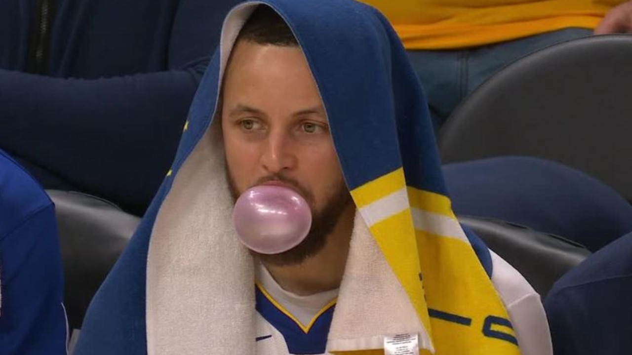Steph Curry was chilling on the bench.
