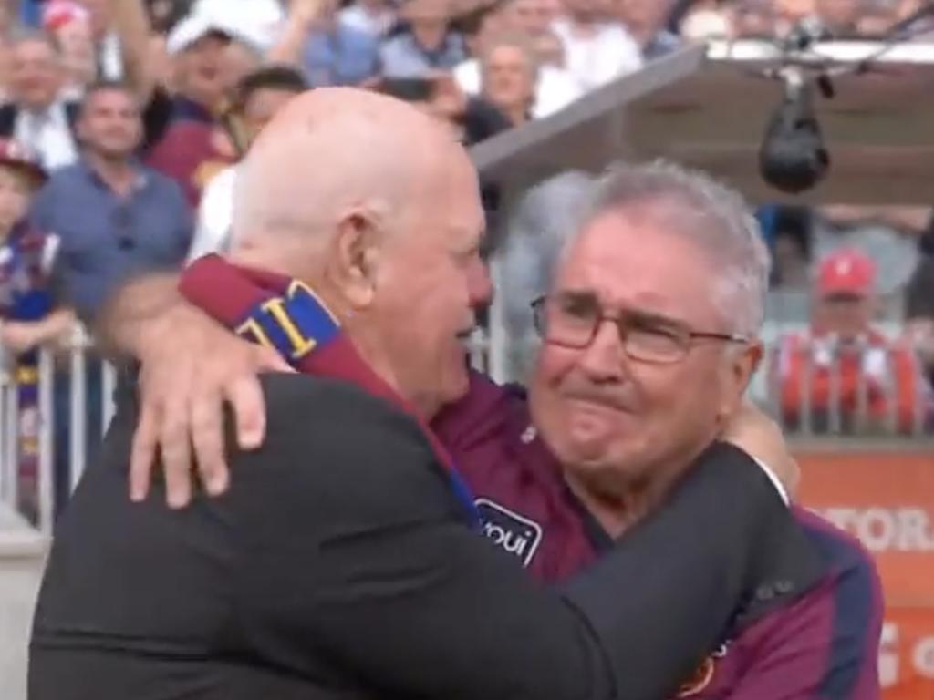 Matthews and Fagan embrace after the siren at the MCG as the Lions win the 2024 premiership. Picture: Channel 7