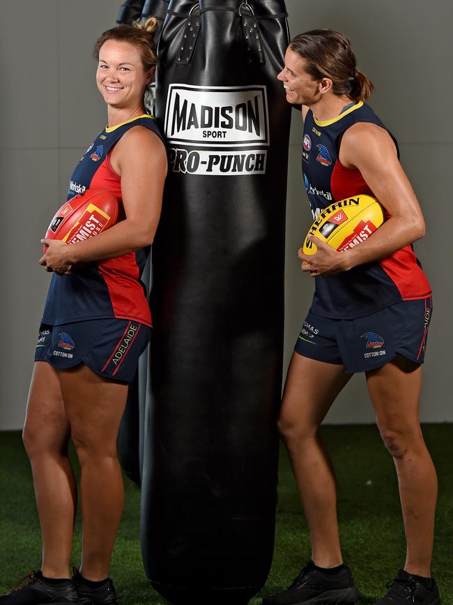 Courtney Cramey and Chelsea Randall chat about the good old days of women’s football. Photo: Naomi Jellicoe