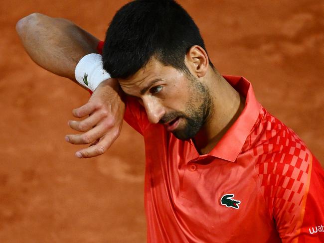 PARIS, FRANCE - MAY 31: Novak Djokovic of Serbia reacts against Marton Fucsovics of Hungary during the Men's Singles Second Round Match on Day Four of the 2023 French Open at Roland Garros on May 31, 2023 in Paris, France. (Photo by Clive Mason/Getty Images)