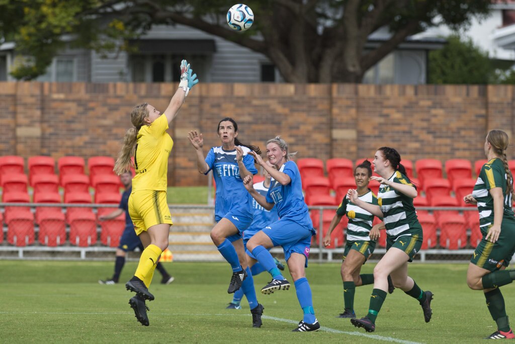 Western Pride keeper defends from Louise Rolfe (centre) and Chantal Frohloff of South West Queensland Thunder against in NPLW Queensland round three football at Clive Berghofer Stadium, Saturday, March 2, 2019. Picture: Kevin Farmer