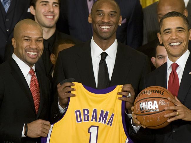 Kobe Bryant (centre) with Derek Fisher and former President Barack Obama. Picture: AFP