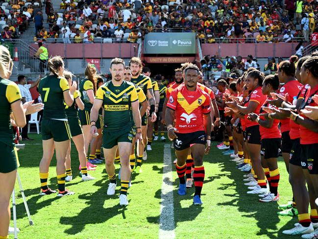 Damien Cook and Judah Rimbu lead their teams out. Picture: NRL