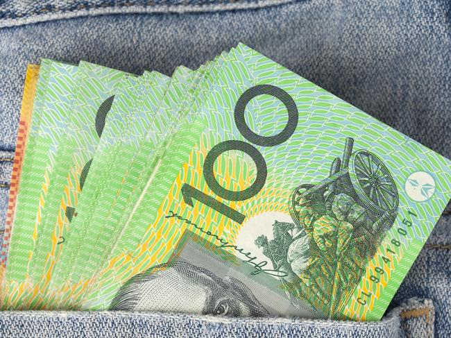 Australian 100 dollar notes in jeans pocket. money, wealthy, rich generic