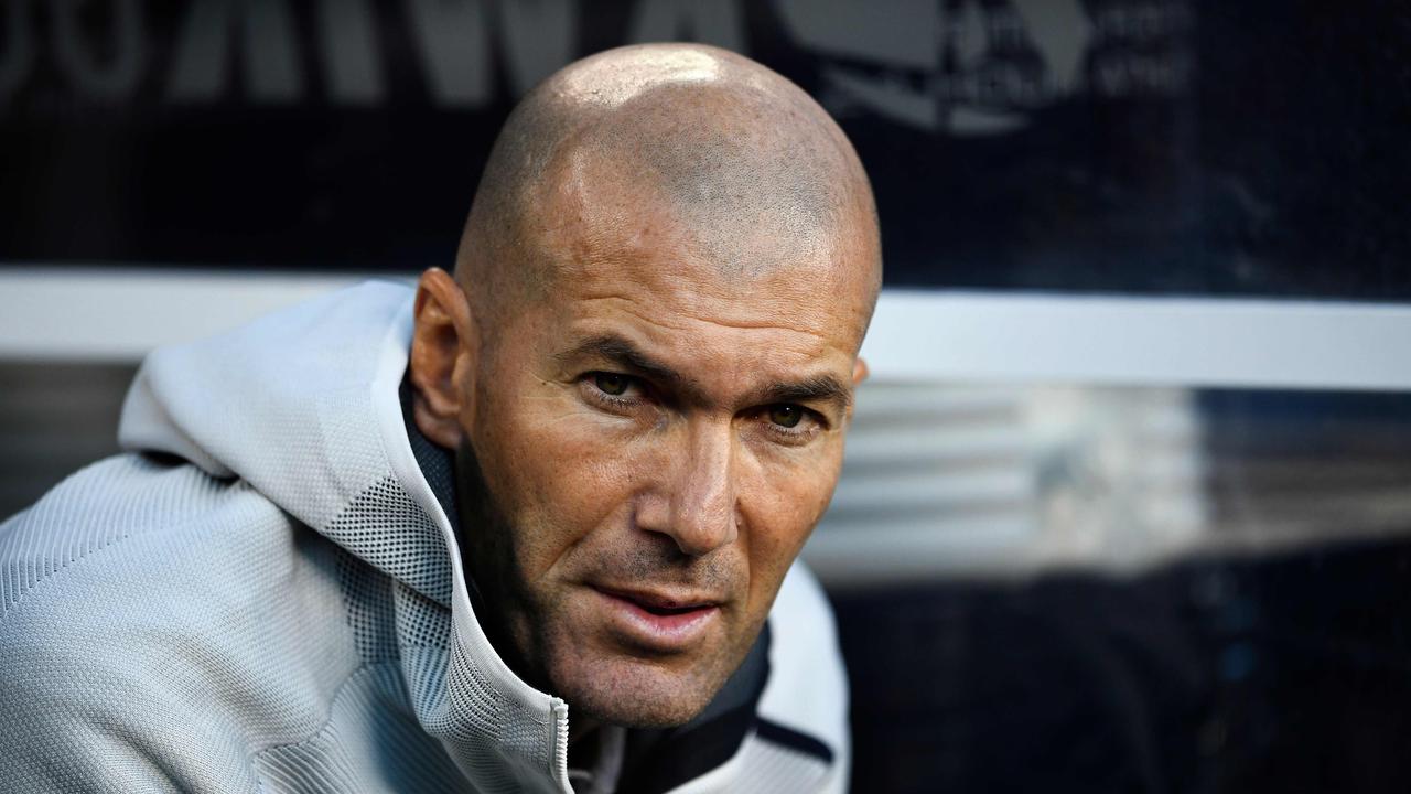 Real Madrid's French headcoach Zinedine Zidane is unimpressed after being overruled by club president Florentino Perez. (Photo by Johannes EISELE / AFP)